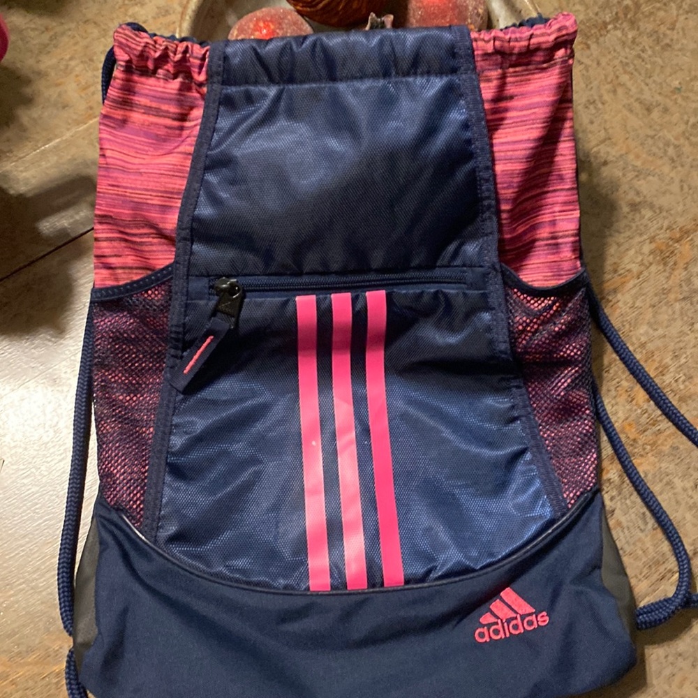 Adidas cinch sack in navy and pink.
